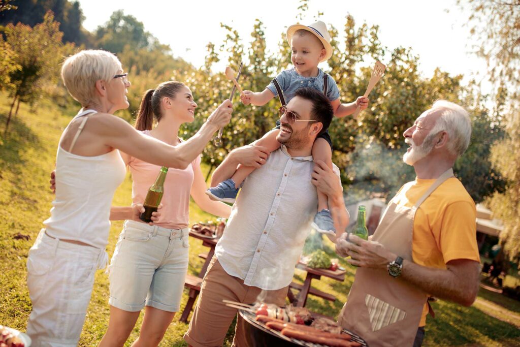 a group of people having a barbeque