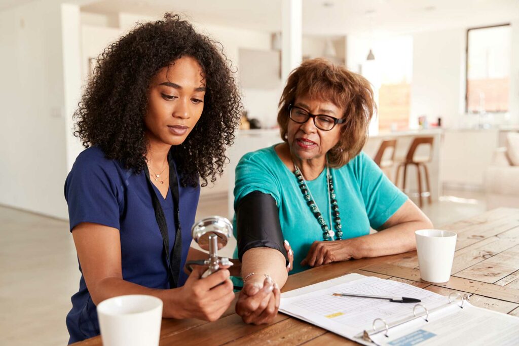 nurse visiting a clients home for medical care