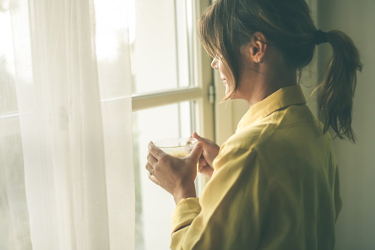 woman drinking cup of tea